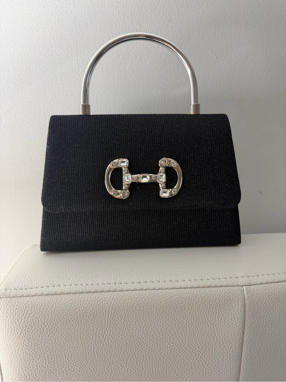 D’ Margaux Black Mini Top-Handle Evening Bag with Crystal Detail.